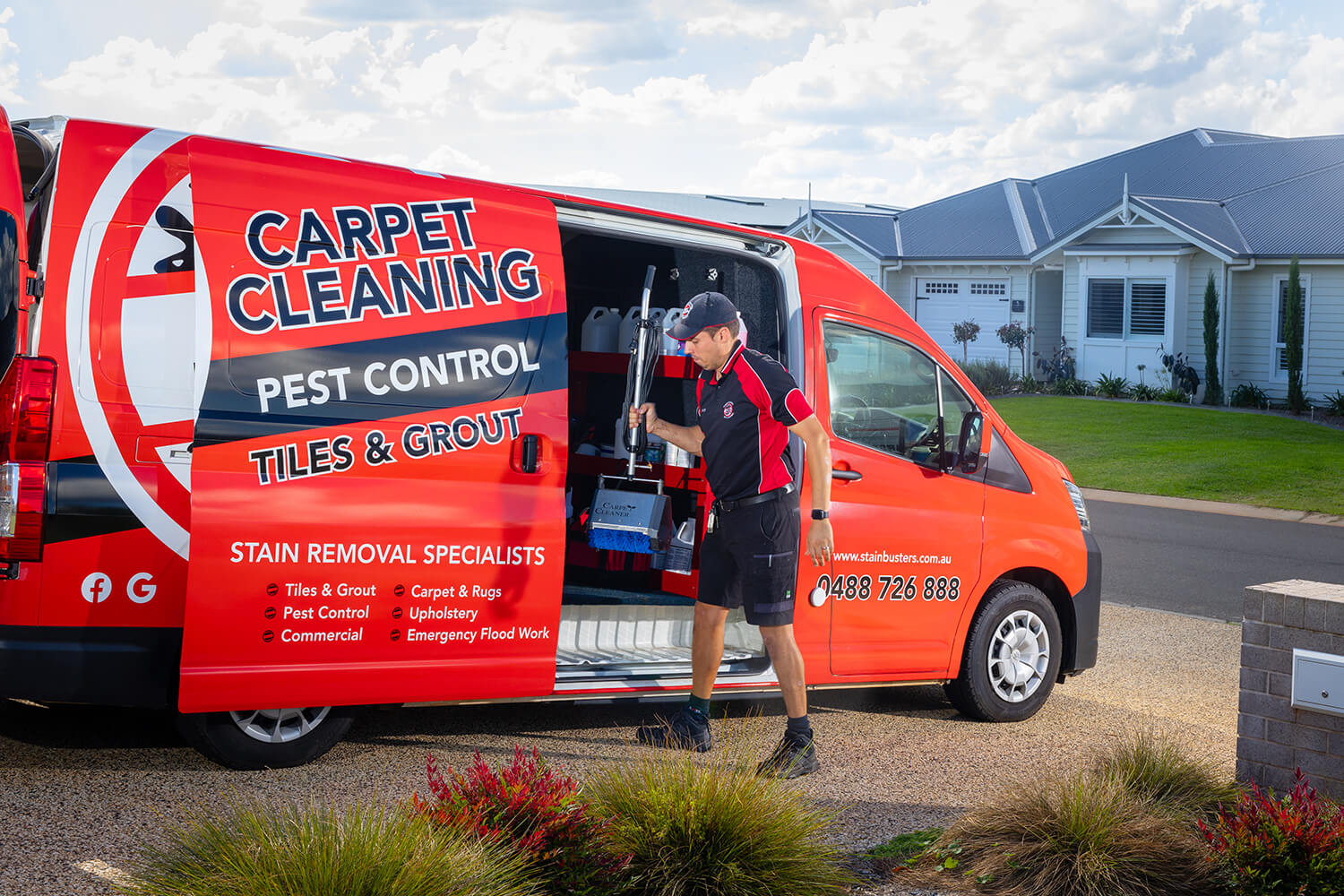 One of the Stain Busters professionals collecting pest control tools from his van